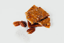 Load image into Gallery viewer, Luck O’ the Irish Toffee -  Tender Toffee, Toasted Pecans &amp; touch of Sea Salt - 1/2 lb. Box
